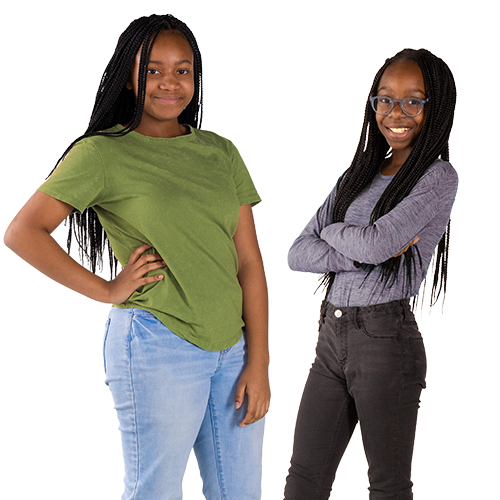 Two teenage girls posing for the camera, one with arms crossed and the other with her hand on her hip.